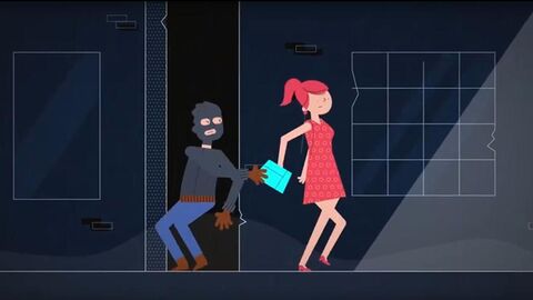 Screenshot aus dem Video; Maskierter Mann greift nach der Handtasche einer vorübergehenden Frau.